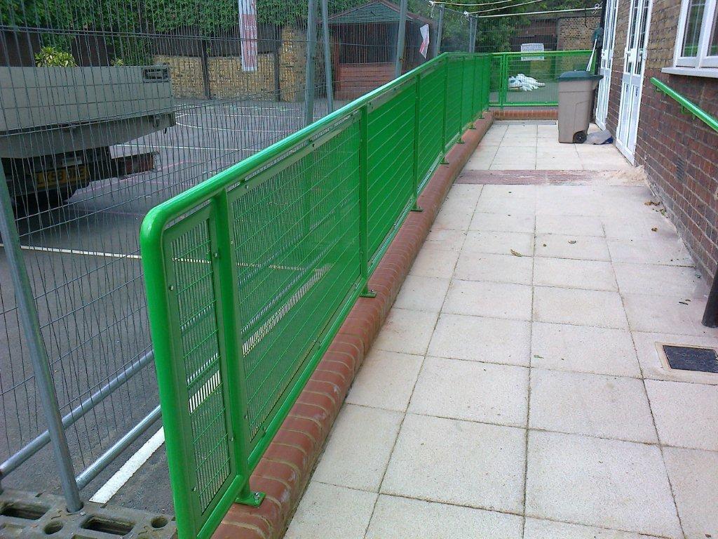 Green powder-coated railings showing WFE finishing and colour range